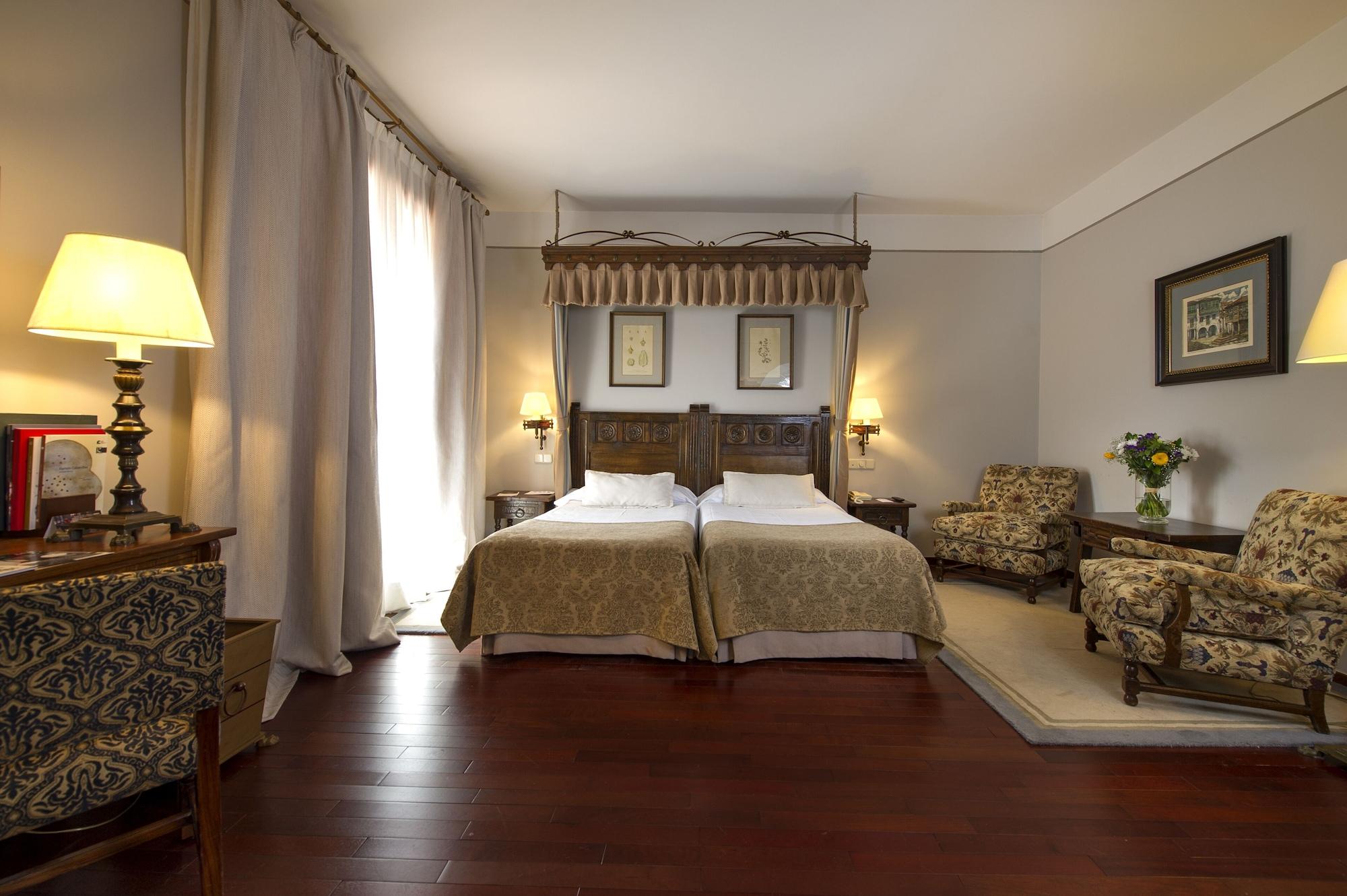 Parador De Santiago - Hostal Reis Catolicos Santiago de Compostela Kültér fotó A room at Hotel Palace Madrid